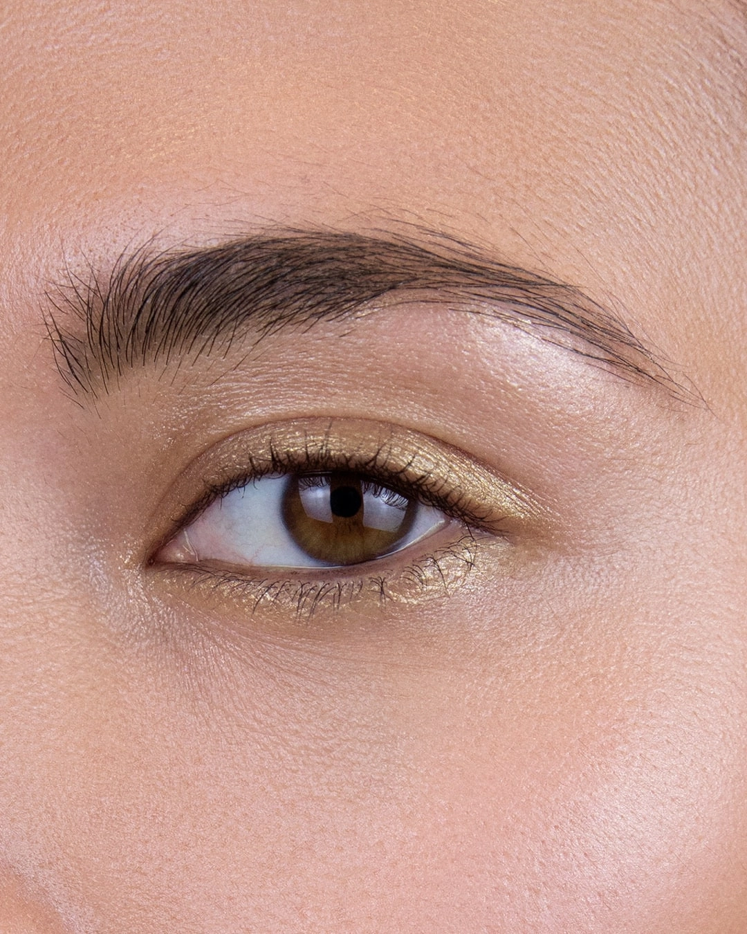 The Starlight Gold eyeshadow stick