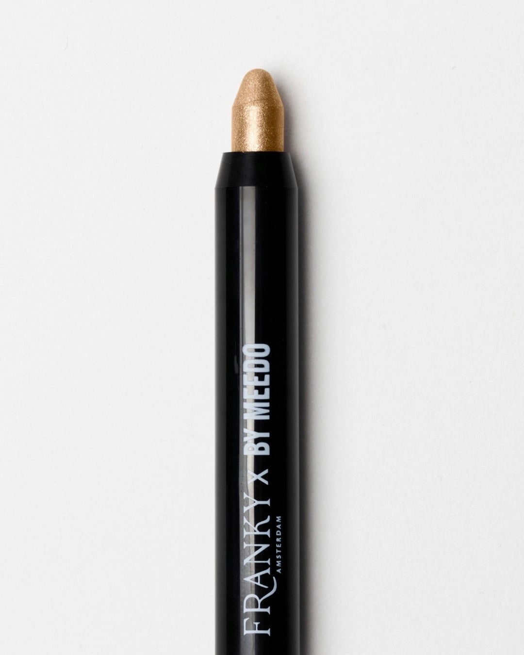 The Starlight Gold eyeshadow stick